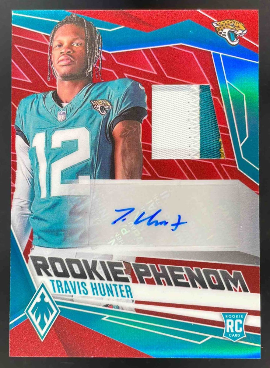 2025 Panini Phoenix Rookie Phenoms Jersey Red #18 Travis Hunter RC Auto /99